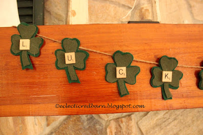 Eclectic Red Barn: Luck Shamrock banner on fireplace mantel
