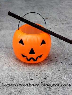 plastic pumpkin and rod