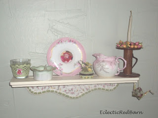 mosaic shelf , vintage saucer picture frame