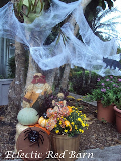 Halloween display, pumpkin spiders, bluish pumpkin