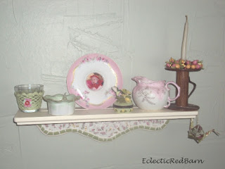 mosaic shelf , vintage saucer picture frame