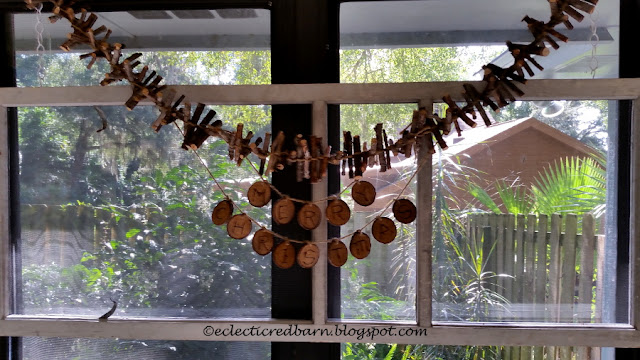Eclectic Red Barn: Old screen with wooden garland and Merry Christmas sign