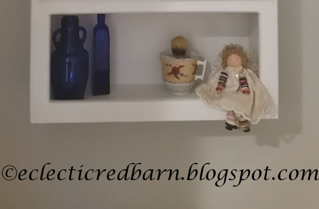 Eclectic Red Barn: Bottom of cabinet with decor