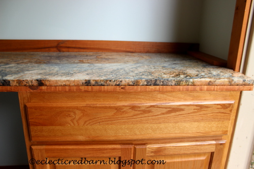 Eclectic Red Barn: cabinet with granite counter top