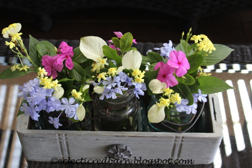 Painted sewing drawer wiht mason jars and flowers