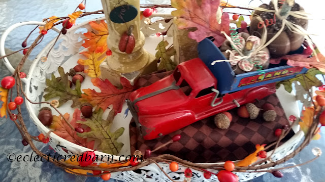 Pumpkins, Spindles, and Vintage Truck Share NOW. #falldecor. #fallvignette #pumpkins #vinatge #eclecticredbarn