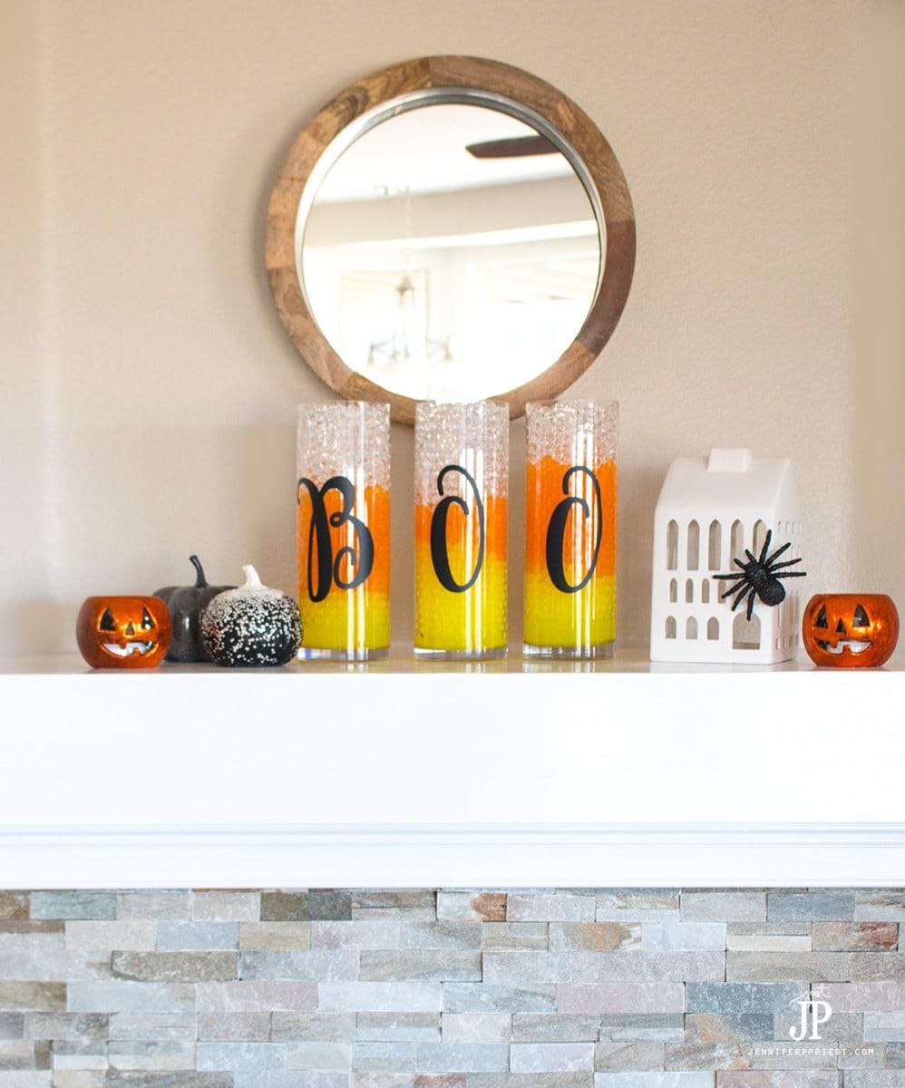 https://www.redfin.com/blog/wp-content/uploads/2020/10/BOO-Diy-Candy-Corn-Vases-SMART-FUN-DIY-jenniferppriest.jpg